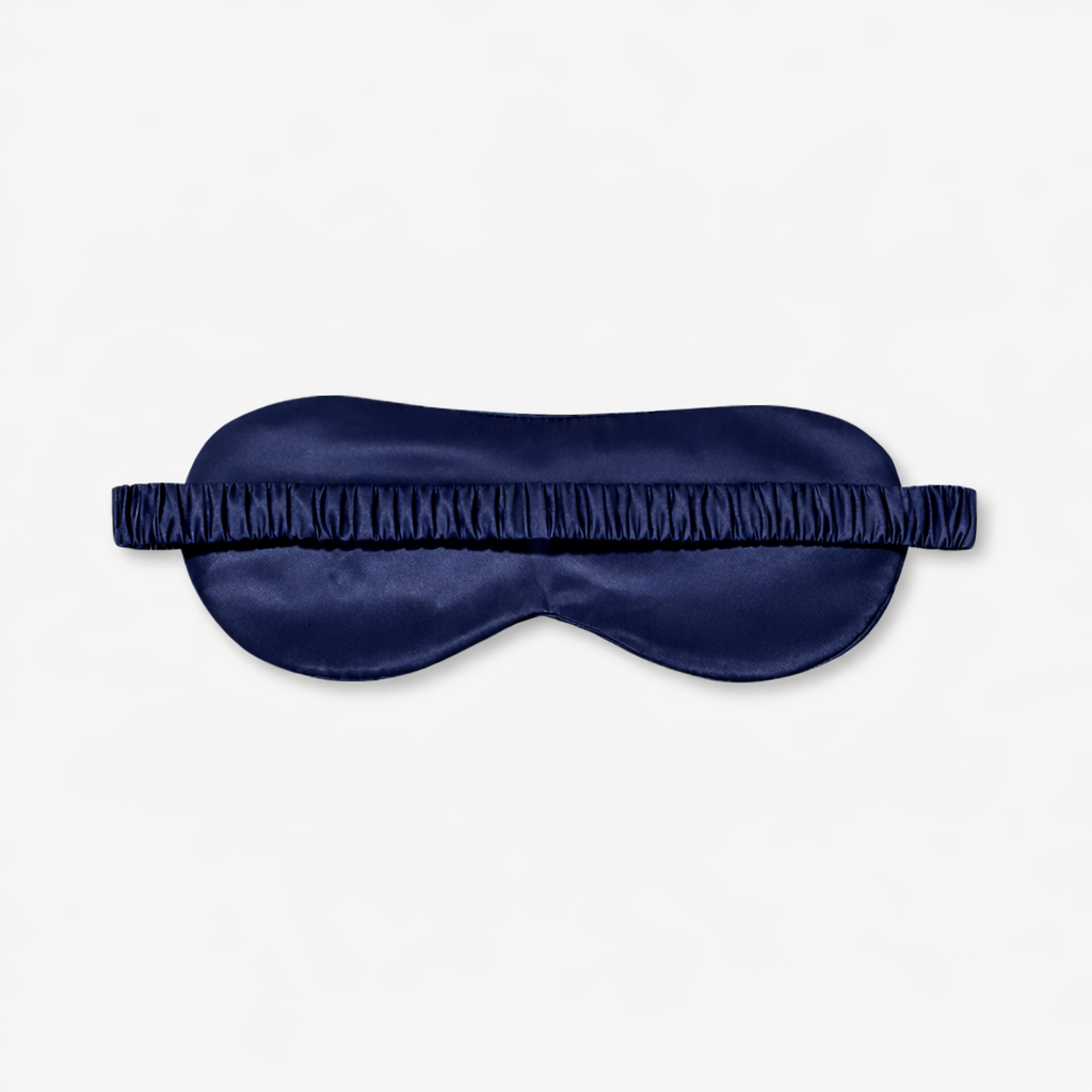 Blue 22 momme mulberry silk sleep mask, front view with a gathered elastic band